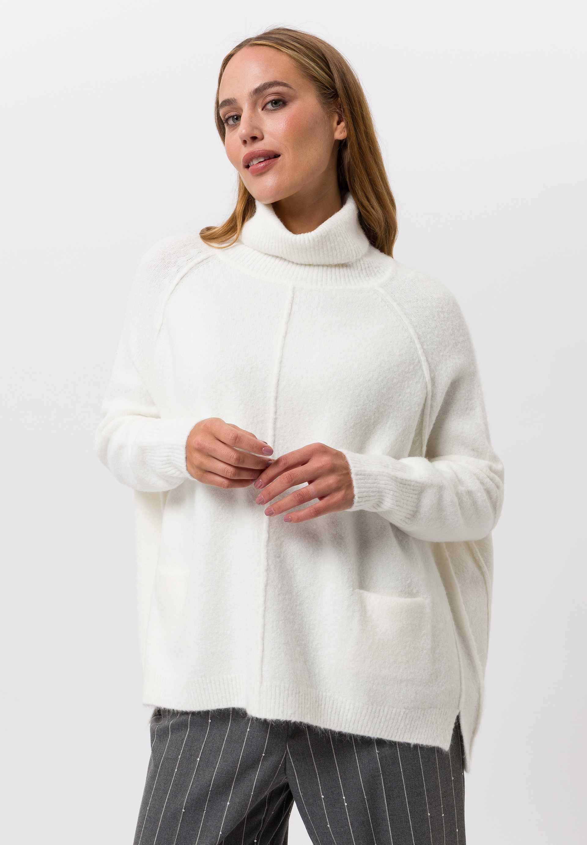 Knitted jumper With stand-up collar twist - Product Image 1